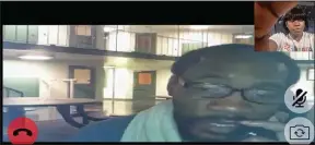  ?? (AP/Alexis Green) ?? Renardo Mitchell speaks with his partner on a video chat from inside the Multnomah County Detention Center in Portland, Ore. Miller, 37, has been jailed for two years on charges of attempted murder and other felonies but chose to represent himself after he didn’t hear from his public defender in five months.