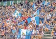  ?? Steven Eckhoff, file ?? Fans react during the Guatemala under-20 national soccer team’s exhibition match in 2022 at Barron Stadium.