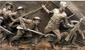  ?? Democrat-Gazette file photo ?? This battle scene is part of the design of the World War I Memorial, which is to become part of Pershing Park along Pennsylvan­ia Avenue in Washington, D.C.