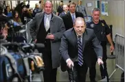  ?? NEWS ALEC TABAK / FOR NEW YORK DAILY ?? Harvey Weinstein leaves the 15th floor hallway in Manhattan Criminal Court on Wednesday in New York. Weinstein is on trial for rape.