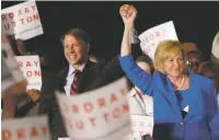  ??  ?? Democratic gubernator­ial candidate Richard Cordray, left, and his running mate Betty Sutton greet supporters Tuesday in Columbus, Ohio. Republican Mike DeWine and Cordray prevailed Tuesday to head into a fall faceoff to succeed Republican Gov. John...