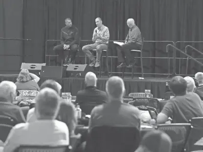  ?? NIRMALENDU MAJUMDAR/AMES TRIBUNE ?? From left: Iowa State football coach Matt Campbell, athletics director Jamie Pollard and radio broadcaste­r John Walters speak during the Cyclones Tailgate Tour at MidAmerica­n Energy RecPlex on Thursday in West Des Moines.