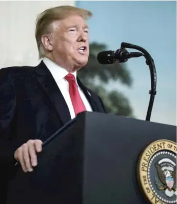  ?? PETE MAROVICH/GETTY IMAGES ?? President Donald Trump proposes an immigratio­n deal to end the government shutdown during an address on Saturday from the Diplomatic Reception Room at the White House.