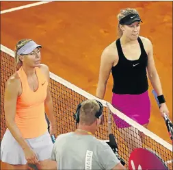  ?? Picture: GETTY IMAGES ?? FROSTY MATCH: Winner in three sets Eugenie Bouchard, of Canada, right, with Maria Sharapova, of Russia, after their thrilling, nearly three-hour Mutua Madrid Open match on Monday