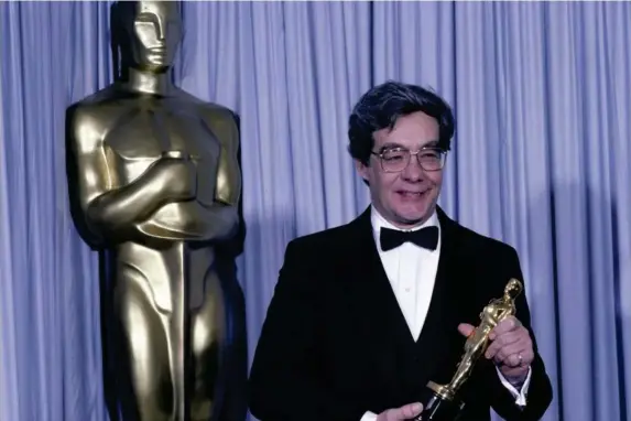  ??  ?? Luedtke picks up his Academy Award in 1986 (Walt Disney Television/Getty)