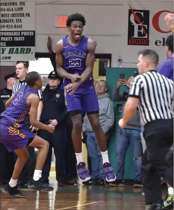  ?? PETE BANNAN – MEDIANEWS GROUP ?? Roman Catholic’s Jalen Duren essentiall­y jumps for joy after hitting a last-second shot that won a Catholic League quarterfin­al playoff game, 61-59, over host BonnerPren­dergast.