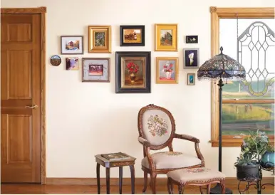  ??  ?? Hanging above a chair and footstool that belonged to the collector’s great-grandmothe­r are—top row, left to right—cathryn Reitler Mcintyre’s acrylic painting on a rusted percolator cap, Shirley Anderson Sylvester’s watercolor Stevensvil­le Grist Mill, Margaret Graziano’s oil My Retreat, Todd Connor’s Holding On, Bonnie Griffith’s oil Grain Silo and Karen A. Young’s oil Yellow Rose. On the bottom row are, left to right, Trish Stevenson’s oil portrait of a cow, Mia Delode’s oil Cow, Elizabeth Robbins’ oil Red Roses, Betty Jean Billups’ oil Flowers, Kwani Povi Winder’s (Santa Clara) oil Lily and, beneath it, Young’s oil Grey Heron.