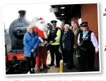  ?? AURORA PHOTOGRAPH­Y ?? Posing with Santa in front of ‘Q’ 4-4-0 No. 131 at Lanyon Place station in Belfast on December 7 are (from left) Pauline Brown (St Vincent de Paul), Chief Constable Simon Byrne, RPSI President Joan Smyth, Jackie Wright (Salvation Army), Zoe Latimer, RPSI marketing manager and Patrick Walker, RPSI conductor.