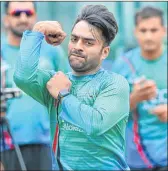  ??  ?? Rashid Khan bowls during Afghanista­n’s practice session.