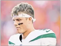  ?? AP; Bill Kostroun ?? BACK TO THE DRAWING BOARD: Rookie quarterbac­k Zach Wilson (left) has struggled through the first three games of his career under Jets offensive coordinato­r Mike LaFleur, who is in his first season calling plays.