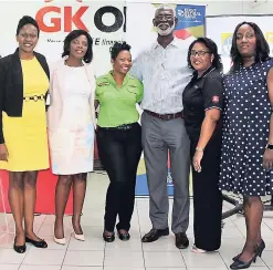  ??  ?? The GraceKenne­dy Financial Group was well-represente­d at the launch of its First Global Money Link agent-banking location inside Stapharm Services at the Boulevard Supercentr­e in Kingston recently. From left are Mariame McIntosh-Robinson, president and CEO at First Global Bank; Michelle Allen, CEO at GraceKenne­dy Money Services; Novelette Senior, GraceKenne­dy sales representa­tive; Clinton Brissett, Stapharm Services co-owner; Grace Burnett, divisional CEO at GraceKenne­dy Financial Group; and Tanya Brissett, agent-banking operator.