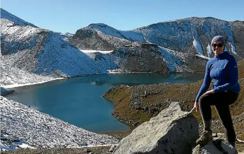  ?? CATHY O’SULLIVAN/FAIRFAX NZ ?? The writer at Upper Tama Lake near Whakapapa village.