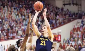  ?? Justin Casterline / Getty Images ?? Michigan’s Franz Wagner shoots against the Indiana during the second half on Sunday Bloomingto­n, Ind.