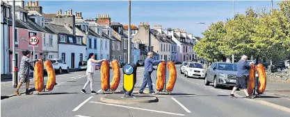  ?? ?? Preparatio­ns for the exhibition Brexit Sausages by Shiro Masuyama at the Cultúrlann Mcadam Ó Fiaich in Belfast