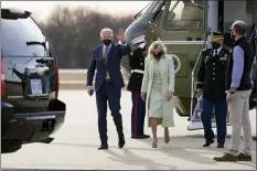  ?? PATRICK SEMANSKY — THE ASSOCIATED PRESS FILE ?? In this March 12, 2021, file photo President Joe Biden and first lady Jill Biden walk to a motorcade vehicle after stepping off Marine One at Delaware Air National Guard Base in New Castle, Del. The Bidens are spending the weekend at their home in Delaware.