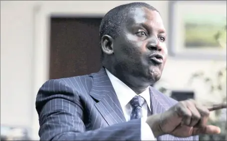  ?? PHOTO: REUTERS ?? Nigerian billionair­e Aliko Dangote in his office in Lagos. Africa’s richest man has a cement empire stretching from Senegal to South Africa, Dangote is a prime example of African entreprene­urship.