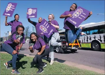  ??  ?? Ethekwini Municipali­ty Transport Authority unit staff encourage commuters to check their Muvo cards for an expiry date. Front, from left,thandokazi Sibulo and Leesha Govender; and back, from left, Lemo Monyatsi, Lee-roy Adams, Erica Ludick and Luendran...