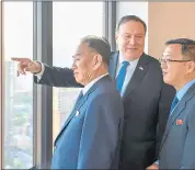  ?? PHOTO BY STATE DEPARTMENT ?? Secretary of State Mike Pompeo points out New York landmarks to North Korean official Kim Yong Chol, left.