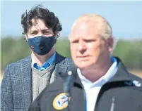  ?? NATHAN DENETTE THE CANADIAN PRESS FILE PHOTO ?? Ontario Premier Doug Ford, pictured with Justin Trudeau in September, says it’s up to the prime minister “to fix the problem” with Canada’s borders.