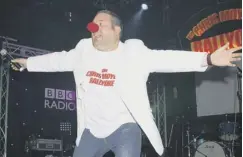  ??  ?? Chris Moyles, main; his first day on Radio One’s breakfast show, 2004, top left; his last at the station, 2012, centre; performing for Comic Relief