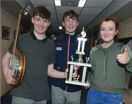  ??  ?? Eoin Turner, Aoife Turner and T J Willis from Kilshannig took victory in the trio music category at the annual Millstreet Féile Cheoil.