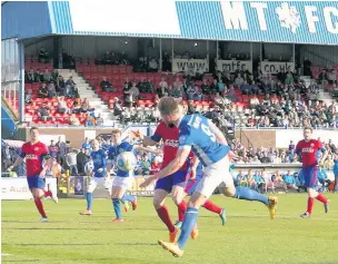  ?? Peter Hilton Photograph­y ?? Action from Macclesfie­ld’s game against Aldershot at the Moss Rose