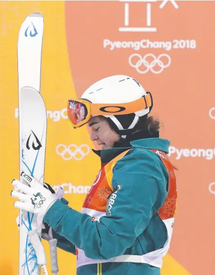  ?? Picture: RYAN PIERSE ?? An emotional Britt Cox after finishing fifth in the women’s moguls final.