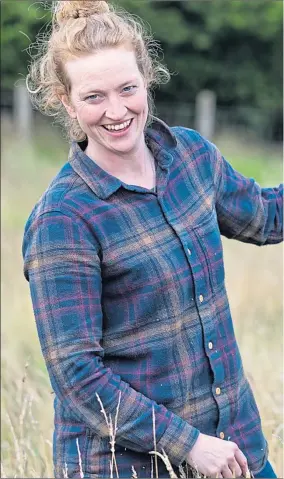  ??  ?? Farmer Nikki Yoxall with one of her agroforest­ry cattle on the