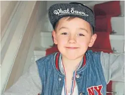  ??  ?? Ciaran Williamson, eight, died after a gravestone fell on him at Craigton Cemetery in Glasgow in 2015.