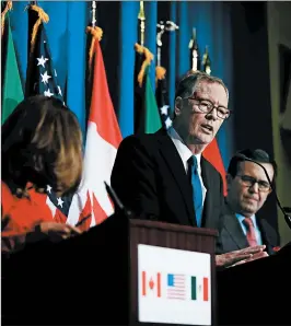  ?? MANUEL BALCE CENETA/AP ?? U.S. official Robert Lighthizer, center, Canada’s Chrystia Freeland and Mexico’s Ildefonso Guajardo Villarreal report after 2017 NAFTA talks. Canada and Mexico may not face tariffs.