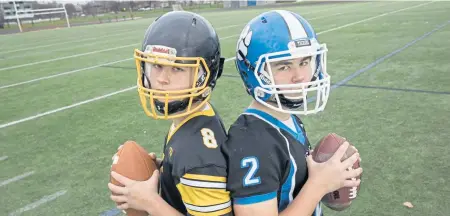 ?? NICOLAUS CZARNECKI / BOSTON HERALD ?? NO LOVE LOST: Twin brothers Zach (left) and Jake Maffeo will continue to support each other no matter what happens tomorrow when Latin Academy and O’Bryant play their Thanksgivi­ng game.