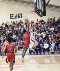  ?? The Sentinel-Record/Tanner Newton ?? ■ Fountain Lake’s Evan East (10) attempts a layup, and Arkadelphi­a’s Courtlon Crow (11) tries to block the attempt at Irvin J. Bass Gymnasium Tuesday night.