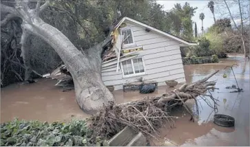  ?? David Butow For The Times ?? DOZENS OF San Jose residents were displaced by a Feb. 21 flood. City officials have acknowledg­ed that they were unprepared and have apologized to the community. Above, guest house sits damaged near Coyote Creek.