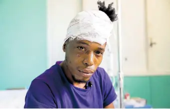  ?? GLADSTONE TAYLOR/MULTIMEDIA PHOTO EDITOR ?? Lamar Nephew at the University Hospital of the West Indies in May last year after presenting with a spear from a fishing gun lodged in his face.