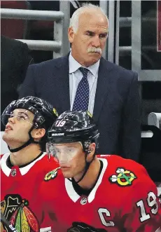  ?? JONATHAN DANIEL/GETTY IMAGES/FILES ?? With other coaches on the hot seat, ex-Blackhawks boss Joel Quennevill­e is sure to be a hot commodity.