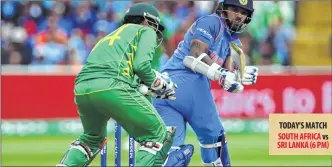  ??  ?? India’s Rohit Sharma in action during the the rain-interrupte­d ICC Champions Trophy match with Pakistan at Edgbaston in Birmingham, England on Sunday. India won the match by a huge margin of 124 runs. SCORES INDIA (319/3) PAK 164 in 33.4 (41), TARGET 289