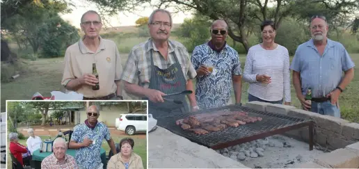  ?? ?? Rotarians Charles Hardy, Dudley Venner, Mxolisi Bambo (president) and Mariëtte Pretorius with guest Malan Pretorius socialise at the braai. Left: President of the Rotary Club of Polokwane, Mxolisi Bambo (standing) with Rotarian Jules Coetzer and his wife, Issie.