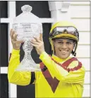  ?? MATT SLOCUM / AP ?? Javier Castellano rode Keen Pauline to a victory Friday in the Black-Eyed Susan Stakes at Pimlico.