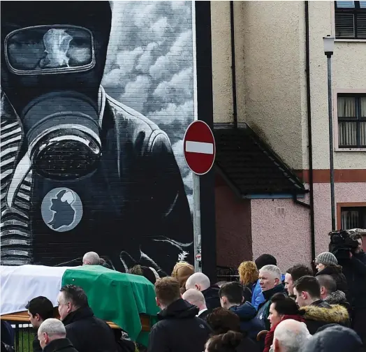  ??  ?? Pall bearers carry the coffin of Martin McGuinness through the streets of Co Derry, Northern Ireland, yesterday. Photo: Reuters/ Clodagh Kilcoyne