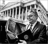  ?? ANDREW HARNIK/ASSOCIATED PRESS ?? Sen. Al Franken leaves the Capitol after addressing the Senate. He said he will depart “in the coming weeks.”