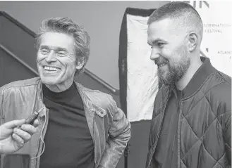  ?? RYAN TAPLIN ?? Actor Willem Dafoe and director Robert Eggers do an interview before the Atlantic Internatio­nal Film Festival screening of The Lighthouse at the Park Lane Theatre in September.
