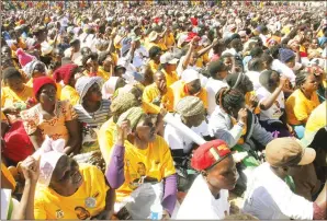  ?? — (Picture by John Manzongo) ?? Thousands of ZANU-PF supporters chant party slogans during a rally addressed by Vice President Dr Constantin­o Chiwenga in Glendale yesterday.