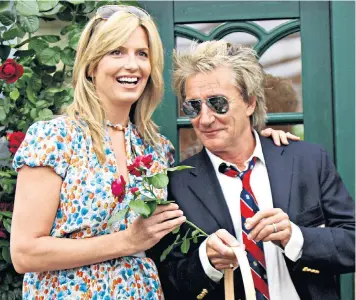  ??  ?? Penny Lancaster with her husband Rod Stewart, and left, modelling tights in 1993