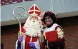  ?? FOTO: GETTY IMAGES ?? Umstritten: „Sinterklaa­s“mit „Zwarte Piet“.