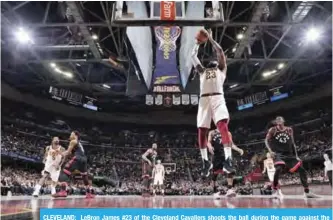  ??  ?? CLEVELAND: LeBron James #23 of the Cleveland Cavaliers shoots the ball during the game against the Toronto Raptors at Quicken Loans Arena in Cleveland, Ohio.— AFP