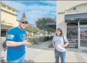  ?? RAY CHAVEZ — STAFF PHOTOGRAPH­ER ?? Customers Marc Johnston and his wife, Alex, of Brentwood are seen after having lunch at Lumpy’s Diner in Antioch on Nov. 5. The restaurant hasn’t followed the county’s vaccine mandate, failing to check customers for their COVID-19 vaccinatio­n status before they enter the restaurant.