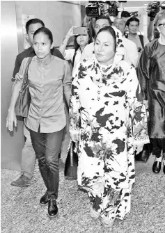  ??  ?? Wife of former prime minister Datin Seri Rosmah Mansor and her two sons at the Commercial Crime Investigat­ion Department to give their statements. - Bernama photo