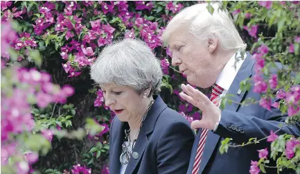  ?? — AP FILES ?? U.S. President Donald Trump, right, talks with British Prime Minister Theresa May in Taormina, Italy, on May 26 during the G7 meeting of leaders.