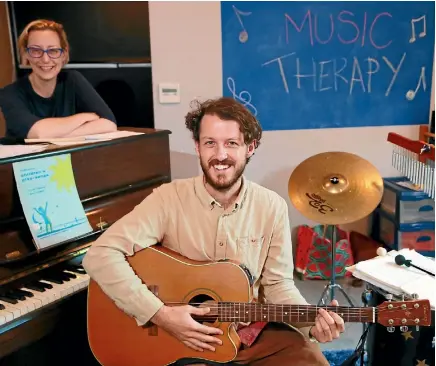  ?? PHOTO: MARK TAYLOR/STUFF ?? Founder of Music Moves Me Dr Vicki Jones and music therapist Nolan Hodgson say playing music can evoke strong memory in dementia sufferers.