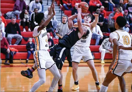  ?? COURTESY OF BILL SNOOK ?? Reading High’s Joey Chapman is fouled going to the basket during the Red Knights’ loss to Archbishop Wood in a PIAA Class 6A secondroun­d game.